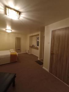 A bed or beds in a room at QT