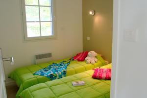 Postel nebo postele na pokoji v ubytování Residence Izarpean