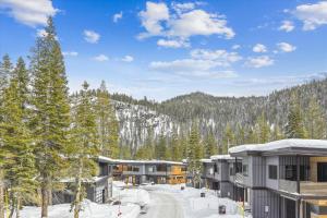 a resort in the mountains with snow and trees at NEW LISTING! Diamond Run at Palisades Tahoe - Pet Friendly and NEW hot tub! in Olympic Valley