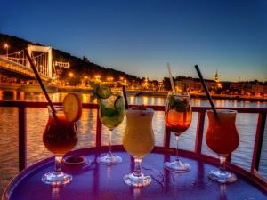 a group of wine glasses sitting on a table at Apartment Castle View in Budapest +54 photos