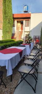 Ресторан / й інші заклади харчування у Alojamiento Villa Jardin