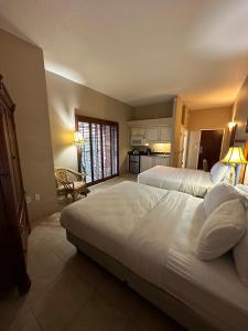 Tahitian Inn Boutique Hotel Tampa房間的床