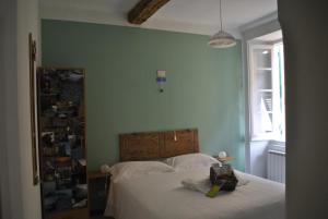 Кровать или кровати в номере Al Piccolo Scoglio - Room & Breakfast