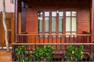 Balkón nebo terasa v ubytování Riverhouse-The Teak House