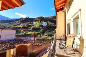 a balcony of a building with a view of a mountain at SENTIERI DEL GARDA in Arco