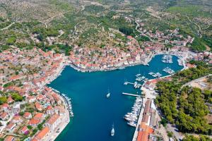 an aerial view of a harbor with boats in the water at APARTMANI MARIS in Milna