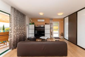 Kuchyň nebo kuchyňský kout v ubytování APARTMANI MARIS + 28 fotografií