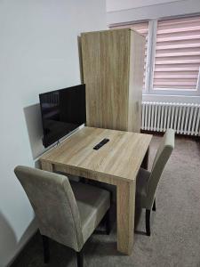TV in/ali zabaviščno središče v nastanitvi Akvarius