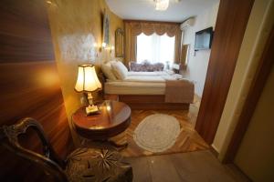 Letto o letti in una camera di Hotel Herc Sarajevo