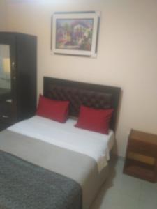 Кровать или кровати в номере Hostal Chachani