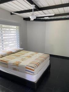 Ένα ή περισσότερα κρεβάτια σε δωμάτιο στο Pa donde José doradal