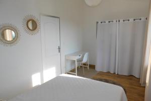 Letto o letti in una camera di Gite des Perrines