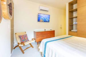 Postel nebo postele na pokoji v ubytování Tortuga Azul Private Terrace Rooftop Pool W BBQ Beach Access 11 Pools Free Beach Club