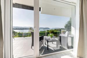 Balkón alebo terasa v ubytovaní Akvarell Apartmanház