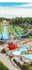 an amusement park with a bunch of water slides at Storekleiv Hyttefelt Tuddal in Tuddal