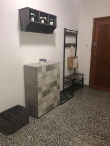 a room with a shelf with plants on a wall at Beautiful,central, two bedrooms apartment in Castello in Castellón de la Plana