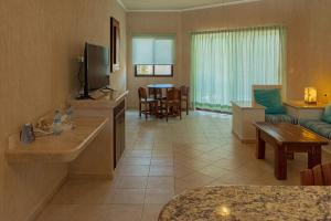 a large living room with a kitchen and a living room at Tecnohotel Beach in San Benito