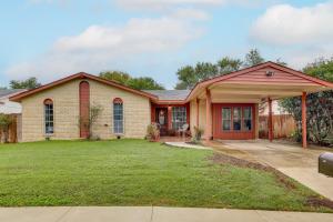 a brick house with a red door at San Antonio Vacation Rental about 15 Mi to Downtown! in San Antonio