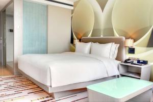 Postelja oz. postelje v sobi nastanitve DoubleTree by Hilton Jakarta - Diponegoro