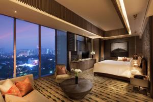 Postelja oz. postelje v sobi nastanitve DoubleTree by Hilton Jakarta - Diponegoro