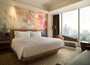 Postelja oz. postelje v sobi nastanitve DoubleTree by Hilton Jakarta - Diponegoro
