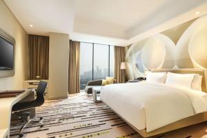 Postelja oz. postelje v sobi nastanitve DoubleTree by Hilton Jakarta - Diponegoro