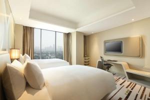 TV in/ali zabaviščno središče v nastanitvi DoubleTree by Hilton Jakarta - Diponegoro