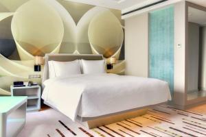 Postelja oz. postelje v sobi nastanitve DoubleTree by Hilton Jakarta - Diponegoro