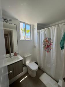 Ванная комната в Depto nuevo a pasos de la playa