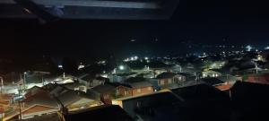 Nespecifikovaný výhled na destinaci Dalcahue nebo výhled na město při pohledu z prázdninového domu