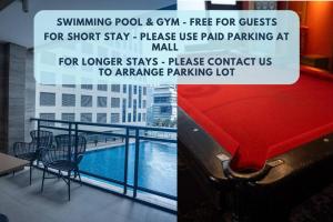 a sign that reads swimming pool gym free for guests for short stayplaces use at Penthouse at Poblacion - 200Mbs net - Awesome view in Manila