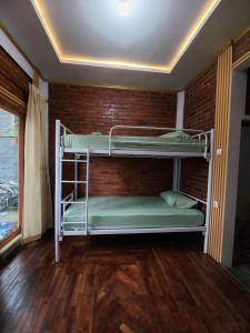Rúm í herbergi á Agora Home