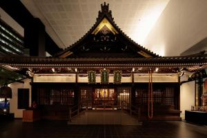 an altar in a building with a roof at Candeo Hotels Osaka Shinsaibashi in Osaka