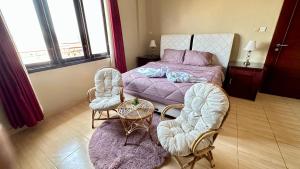 Кровать или кровати в номере Homestay Pelangi Jimbaran