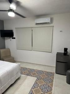 TV a/nebo společenská místnost v ubytování Apartamentos 31