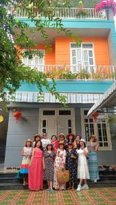 a group of children posing in front of a house at Lavie House số 124-4 Bình Giã in Vung Tau