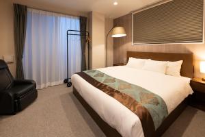 Voodi või voodid majutusasutuse 谷町君Hotel 京都駅東29 toas