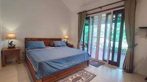 Postel nebo postele na pokoji v ubytování Baan Thansiri 3, HIn Lek Fai, Hua Hin
