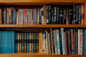 a book shelf filled with lots of books at Mt Taranaki Vista 