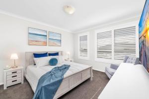 Postel nebo postele na pokoji v ubytování Giuseppina 3 Ebb Tide Way Corlette