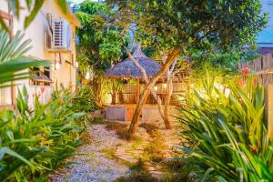 Сад в Tina Garden by M Oasis