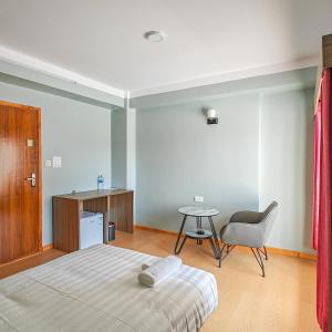 Letto o letti in una camera di Boudha Apart Hotel