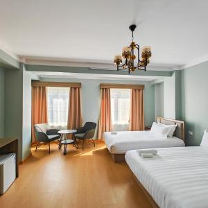 Letto o letti in una camera di Boudha Apart Hotel