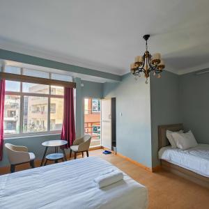 Letto o letti in una camera di Boudha Apart Hotel