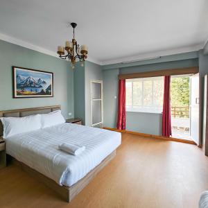 Letto o letti in una camera di Boudha Apart Hotel