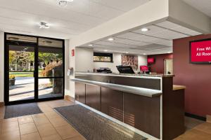 a lobby with a bar in a hospital at Red Roof Inn Cleveland - Westlake in Westlake