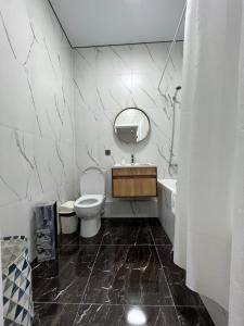 Koupelna v ubytování RAISSON APARTHOTEL Sat CITY 145