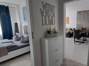 Łóżko lub łóżka w pokoju w obiekcie Apartament-Sweet Night