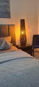 Łóżko lub łóżka w pokoju w obiekcie Apartament-Sweet Night