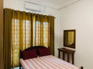 Ένα ή περισσότερα κρεβάτια σε δωμάτιο στο The Paramount Lodge